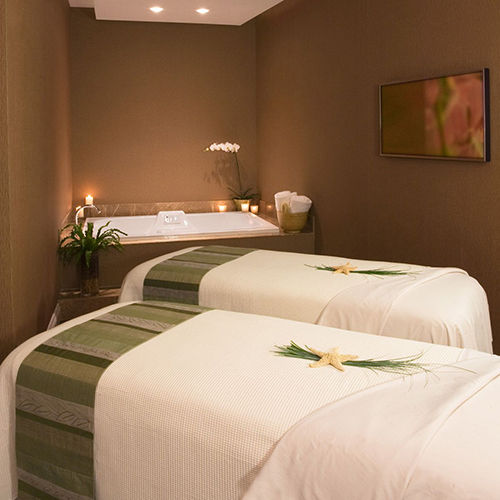 couple's room having two beds inside